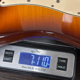 Used 2003 Fender FSR FMT Tex-Mex Tele Sunburst on scale displaying weight.