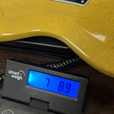 Used 2023 Gibson SG Standard TV Yellow on scale displaying weight.