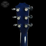 Back of headstock of Used 2005 Taylor T5-S Flame Blue.