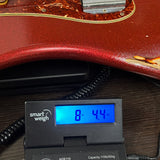 Used 2013 Fender Custom Shop '64 Precision Bass Relic Red Sparkle over Sunburst on scale displaying weight.