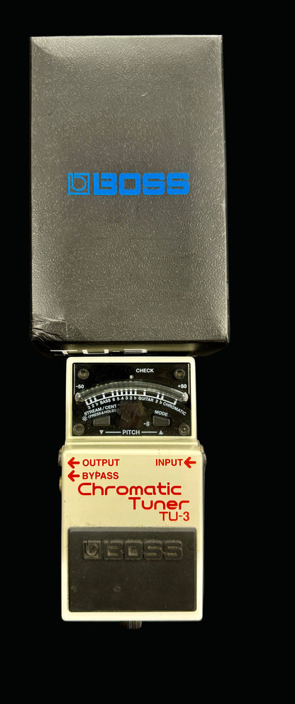 Boss TU-3 Chromatic Tuner on a dark background
