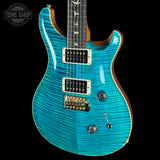 Front angle of Used PRS Custom 24 10-Top Carroll Blue.