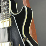 Discoloration in binding of Used Gibson Les Paul Custom Ebony.