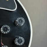 Scratches on body of Used Gibson Les Paul Custom Ebony.