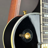 Scratches on body of Used Gibson Les Paul Custom Ebony.