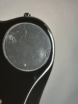 Scratches on back of Used Godin XTSA Trans Black.