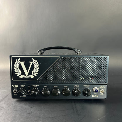Guitar amplifier head with 'VICTORY' branding on a gray background