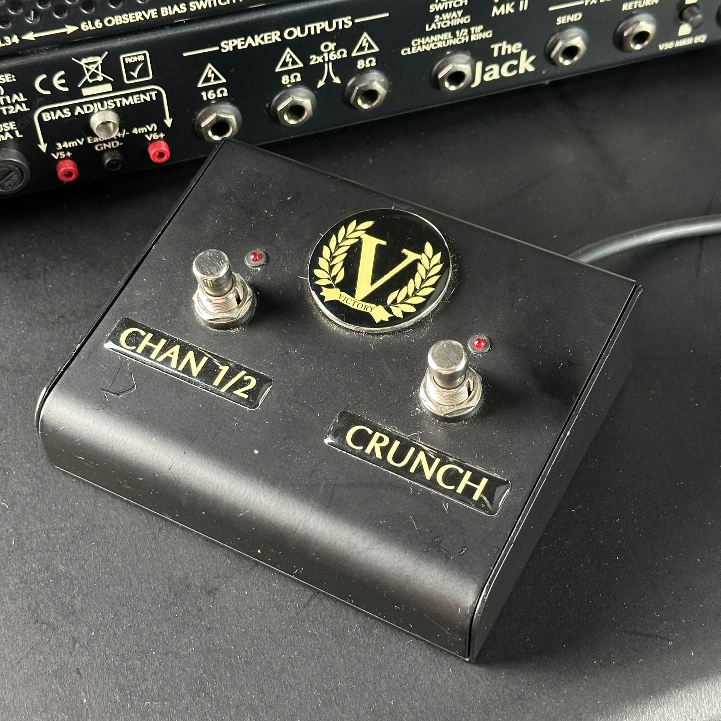 Guitar effects pedal with 'Crunch' branding on a dark surface