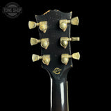 Back of headstock of Gibson Custom Made 2 Measure Dove Double Guard Trans Ebony Light Aged.