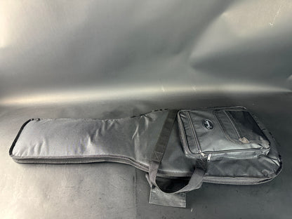 Gray guitar case on a metallic surface