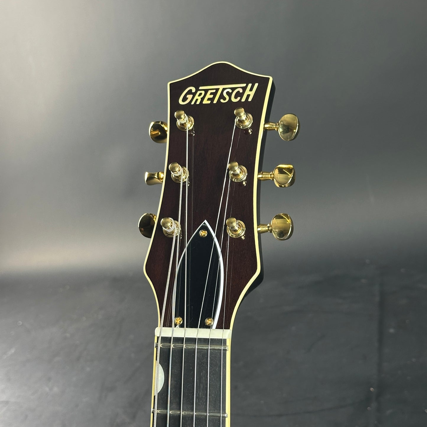 Headstock of Gretsch G6131T-62 Vintage Select Duo Jet Firebird Red.