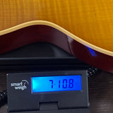 Used 2022 Gibson Custom Shop M2M '59 Les Paul Standard Chambered Murphy Lab Ultra Light Aged Lemon Burst Bigsby on scale displaying weight.