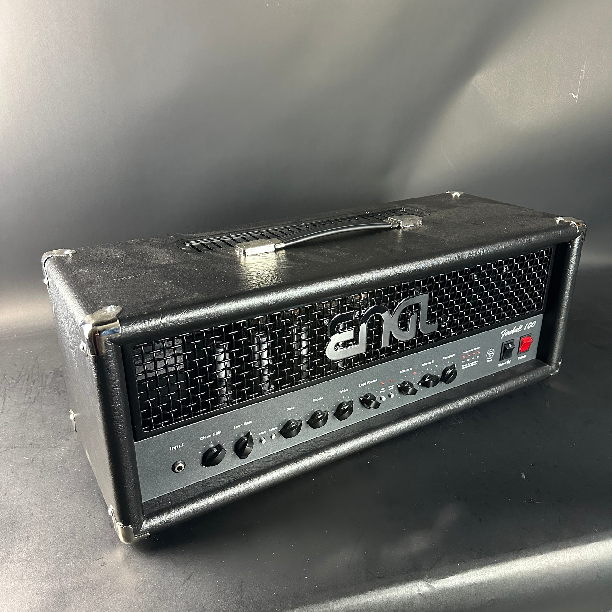 Guitar amplifier head with ' Engl' branding on a reflective surface.