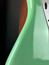 Mark in finish of Used 2016 Fender Classic 60s Jazzmaster Lacquer Surf Green.
