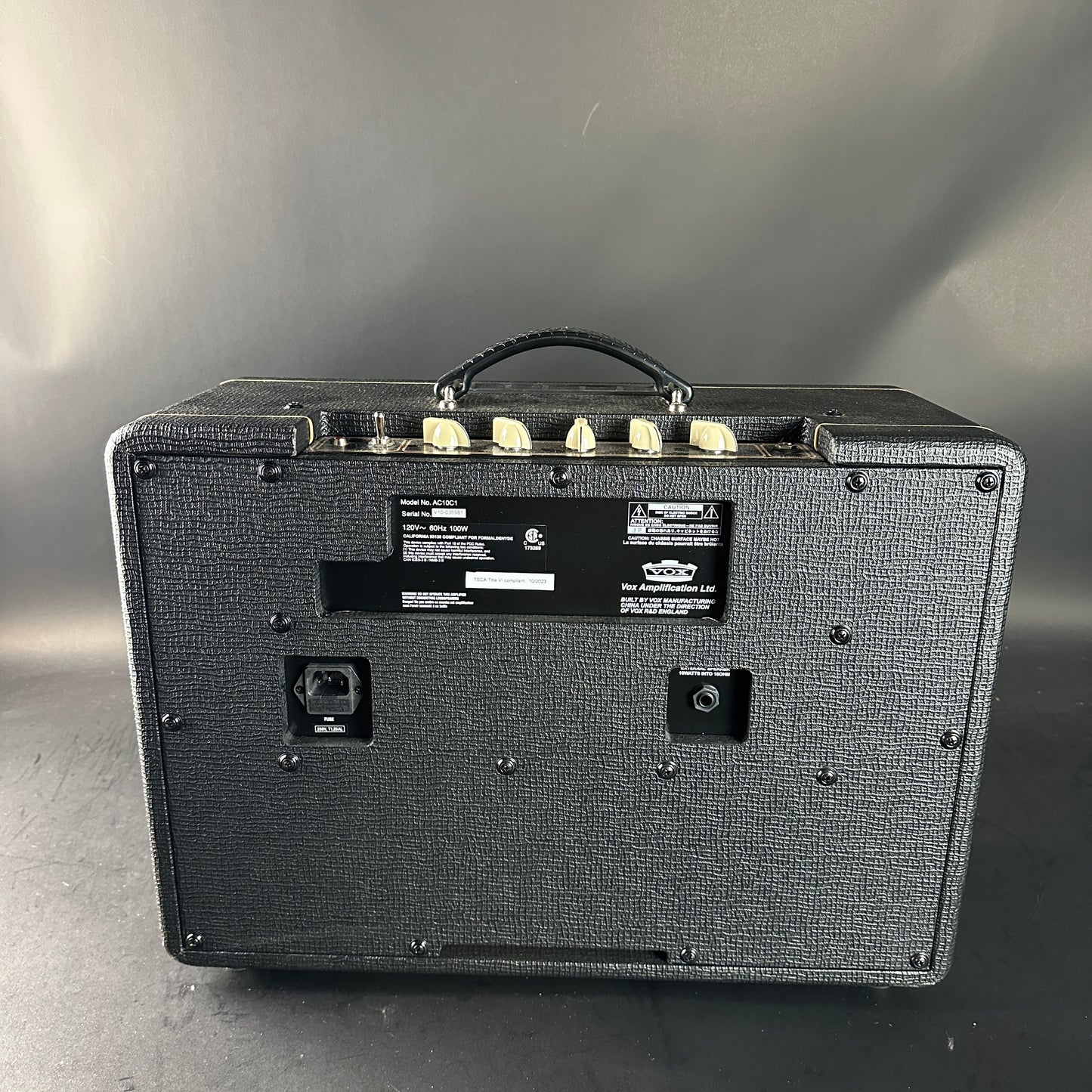 Guitar amplifier on a gray background