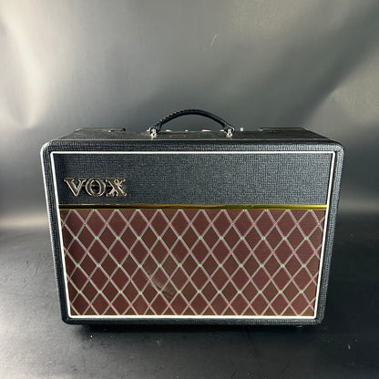 VOX amplifier with diamond pattern on a gray background