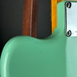 Marks on back of Used 2016 Fender Classic 60s Jazzmaster Lacquer Surf Green.