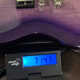 Used 2023 Epiphone SG Modern Figured Purple Burst on scale displaying weight.