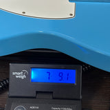 Used 2023 Fender MIJ Limited International Color Telecaster Maui Blue on scale displaying weight.