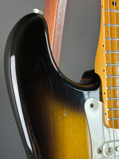 Wear on horn of Used 1984 Fender Fullerton 1957 Stratocaster Reissue 2-Color Sunburst.