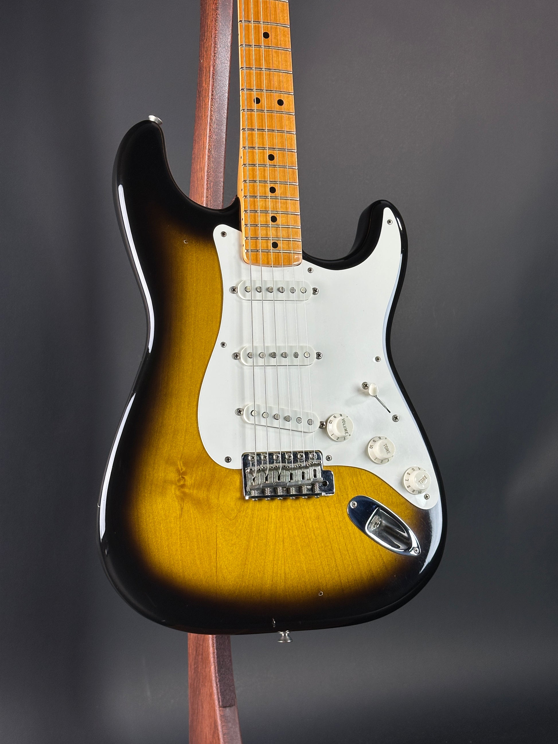 Front angle of Used 1984 Fender Fullerton 1957 Stratocaster Reissue 2-Color Sunburst.