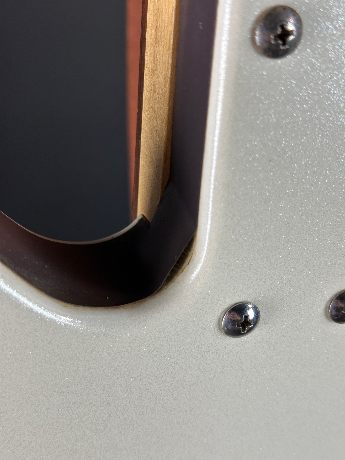 Binding lifting near neck joint of Used Danelectro 6/12 Doubleneck White.