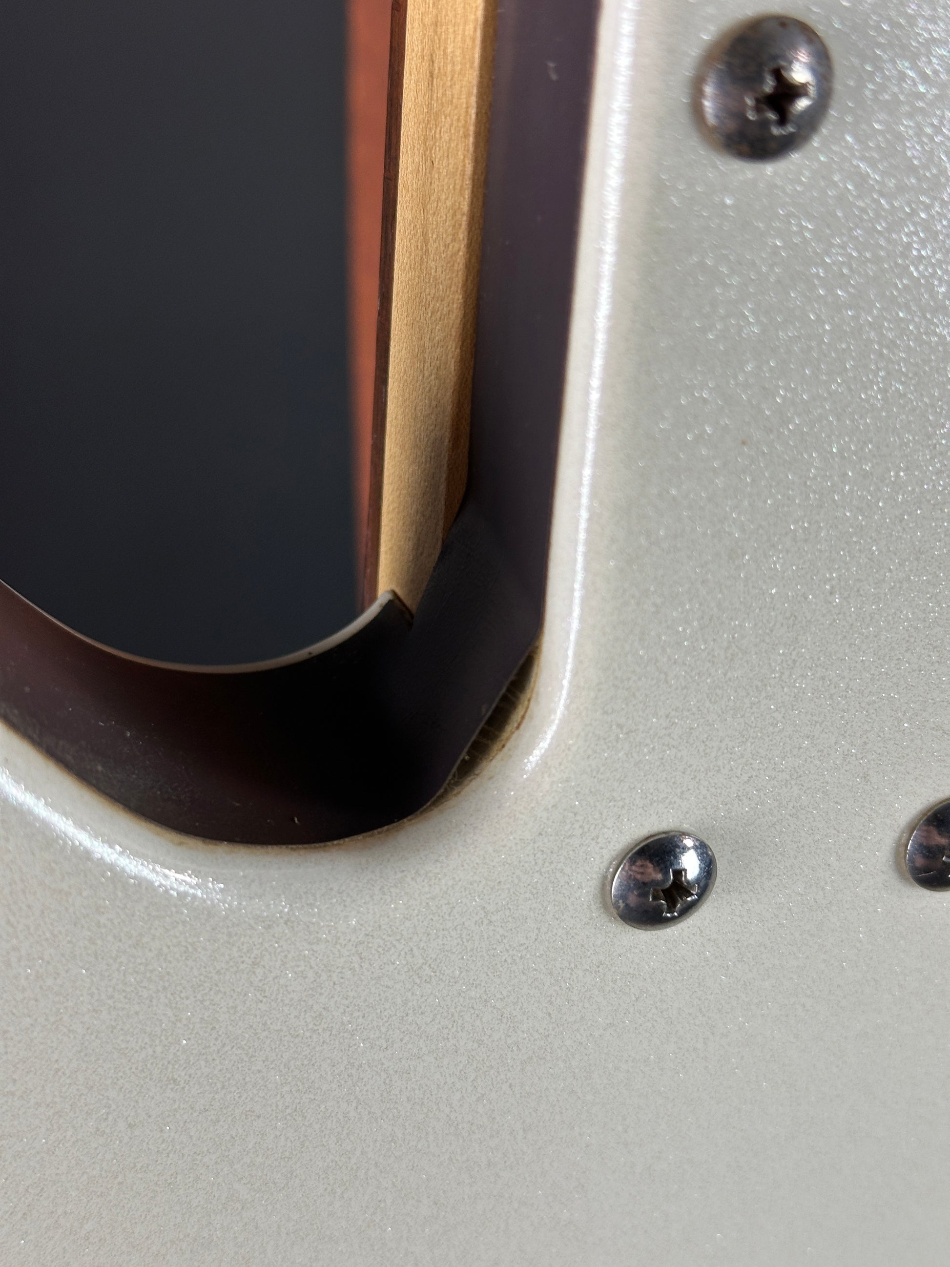 Binding lifting near neck joint of Used Danelectro 6/12 Doubleneck White.