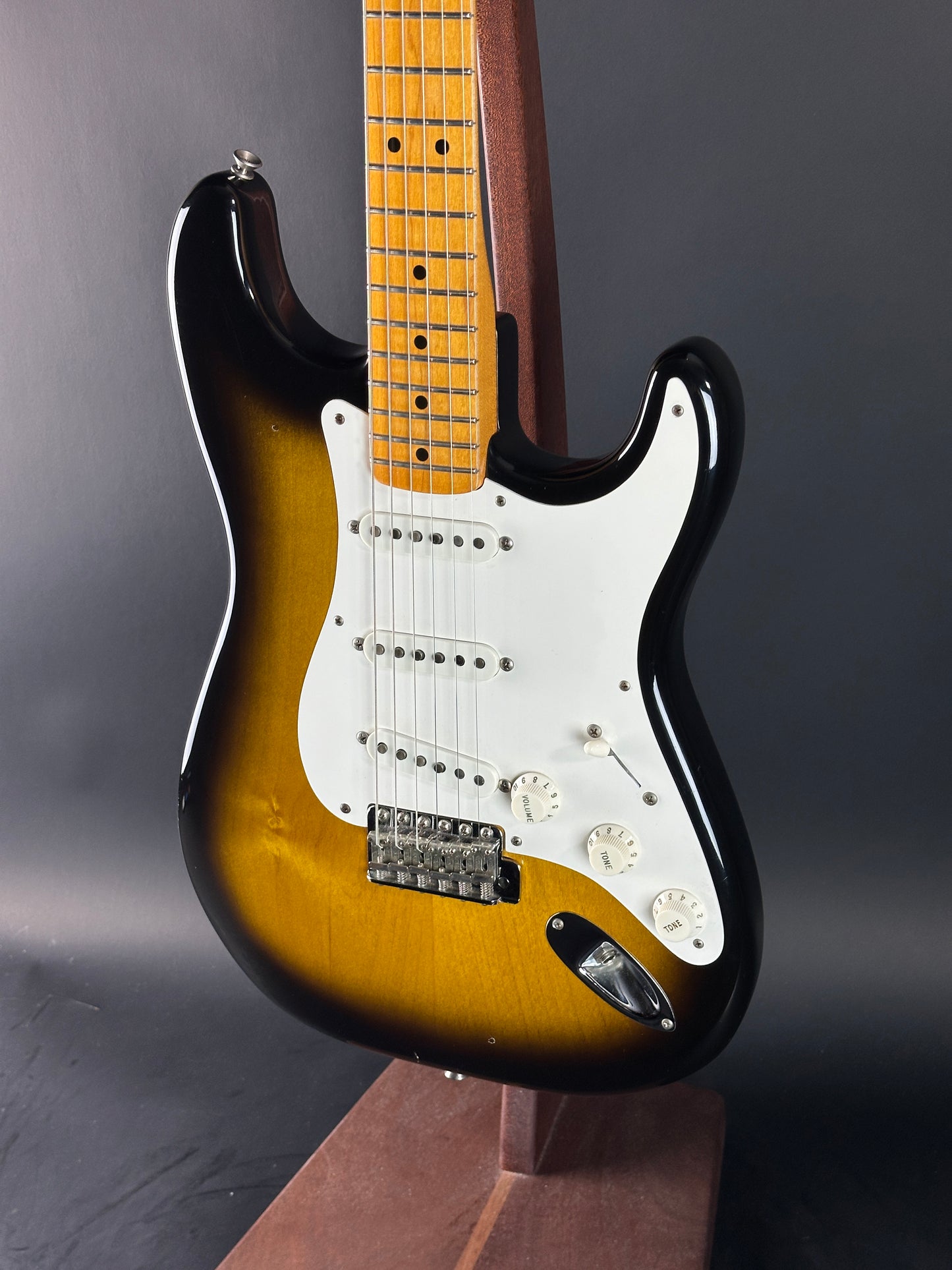 Front angle of Used 1984 Fender Fullerton 1957 Stratocaster Reissue 2-Color Sunburst.