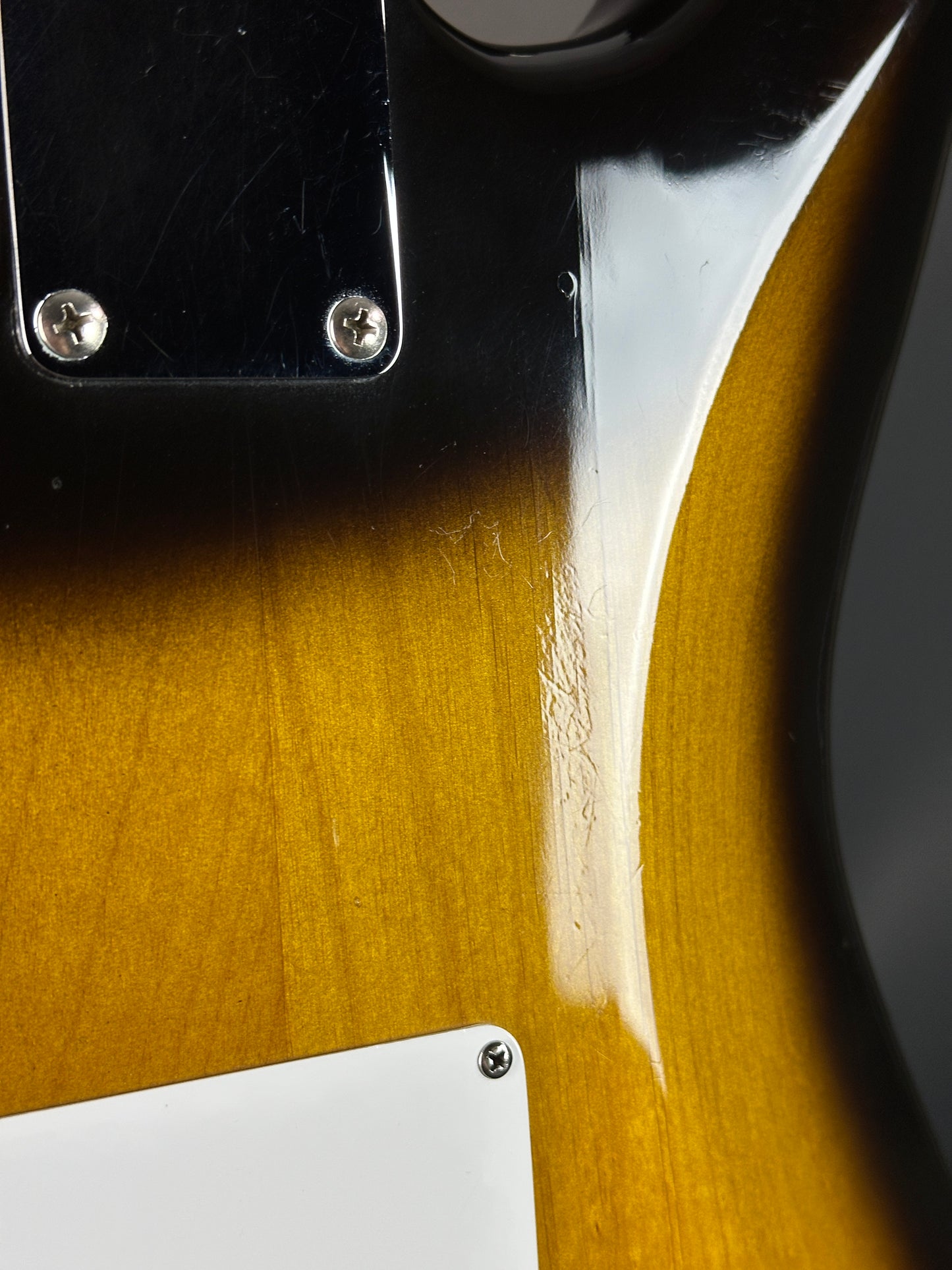 Wear on back of Used 1984 Fender Fullerton 1957 Stratocaster Reissue 2-Color Sunburst.