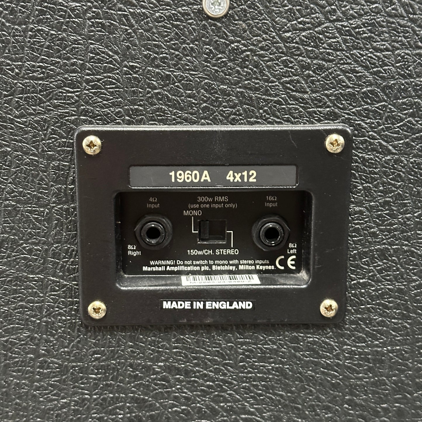 Back panel of a Marshall amplifier with model information and 'Made in England' text.