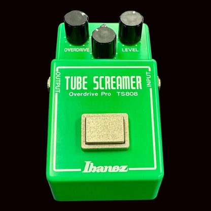Ibanez Tube Screamer overdrive pedal on a gray background