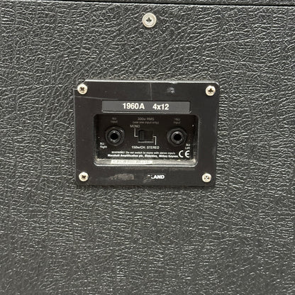 Black guitar amplifier with model number 1960A 4x12 on a textured surface