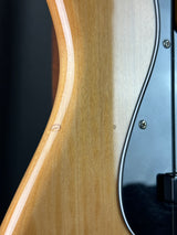Wear on body of Used 2022 Squier Classic Vibe 70s Jazz Bass Natural.