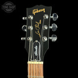 Headstock of Used 2021 Gibson Les Paul Studio Smokehouse Burst.
