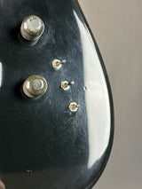 Wear on body of Used 80s Squier MIJ Contemporary HSS Strat Black.
