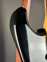 Wear on body of Used 80s Squier MIJ Contemporary HSS Strat Black.
