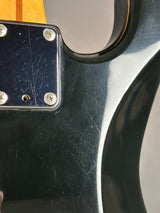 Wear on back of Used 80s Squier MIJ Contemporary HSS Strat Black.