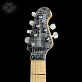 Headstock of Ernie Ball Music Man 30th Anniversary Axis Translucent Black Quilt.