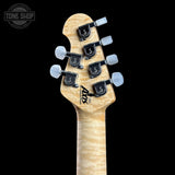 Back of headstock of Ernie Ball Music Man 30th Anniversary Axis Translucent Black Quilt.