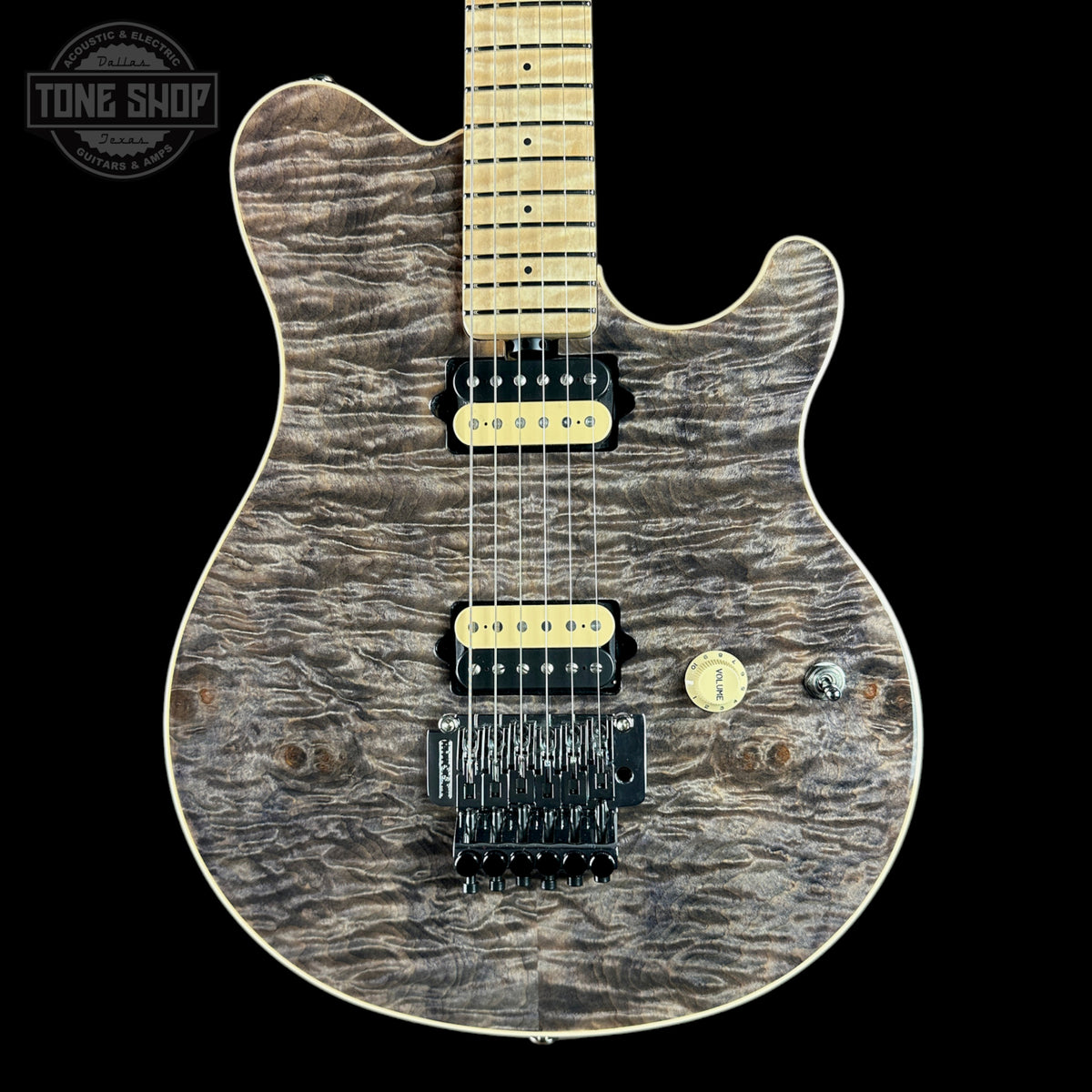 Front of Ernie Ball Music Man 30th Anniversary Axis Translucent Black Quilt.