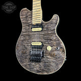 Front angle of Ernie Ball Music Man 30th Anniversary Axis Translucent Black Quilt.