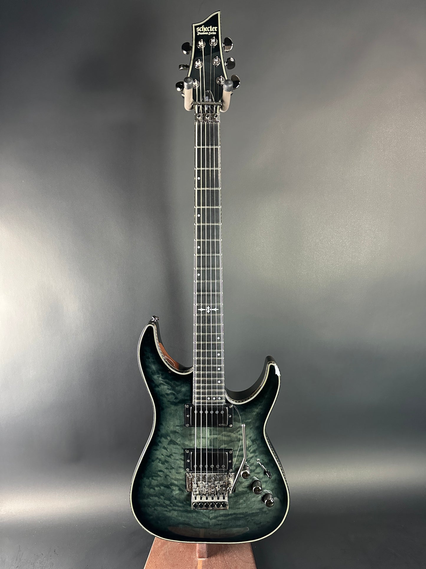 Electric guitar with a textured body on a gray background