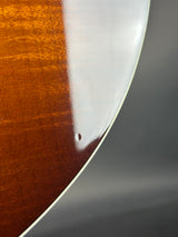 Ding on back of Used Taylor 615ce Sunburst.