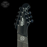 Headstock of Ernie Ball Music Man Majesty 8 Select Strawberry Moon EB.