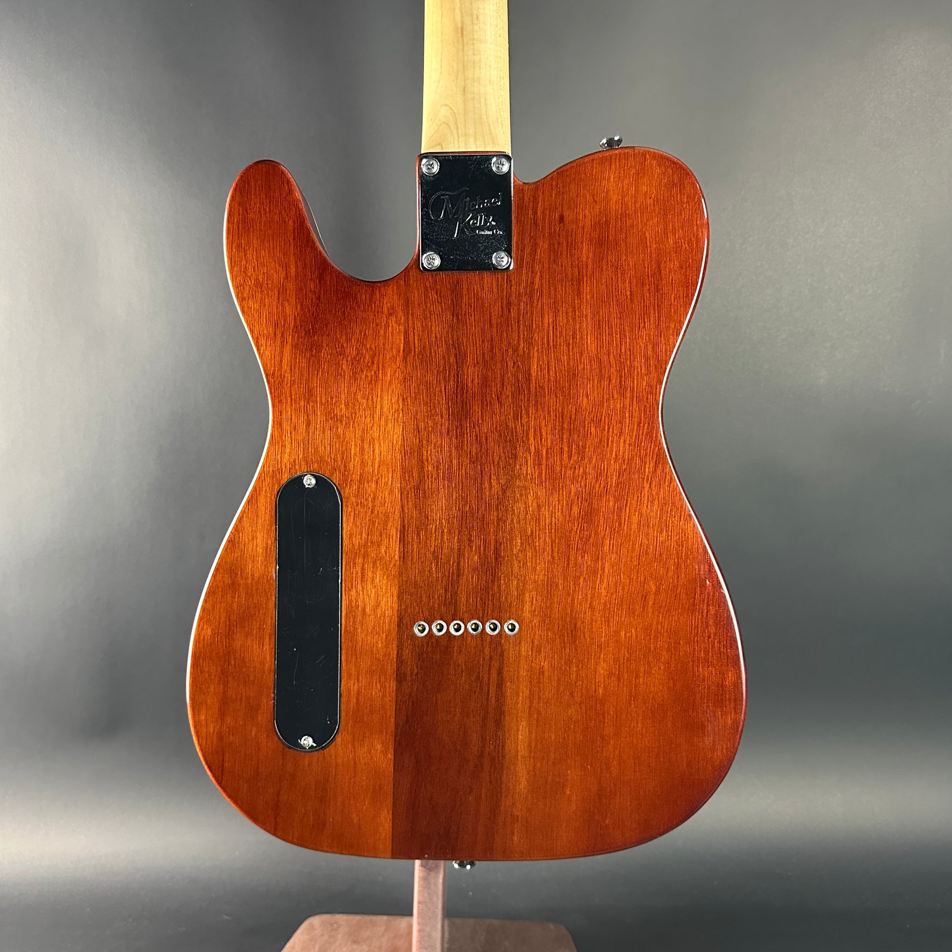 Back of Used Michael Kelly 59 Thinline Spalted Maple.