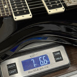 Used 2022 PRS CE-24 Black on scale displaying weight.