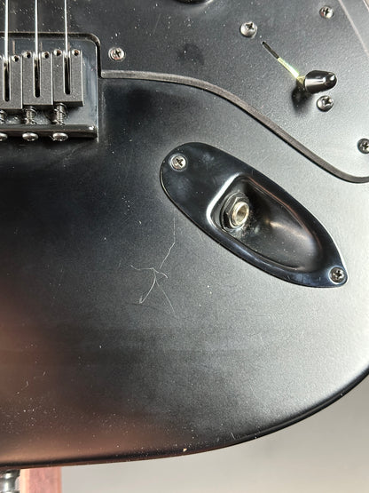 Scratch near output jack of Used Fender Jim Root Signature Strat.