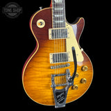 Front angle of Gibson Custom Dealer Select 1959 Les Paul Standard Chambered Tejas Burst AAA Top Bigsby Ultra Light Aged.