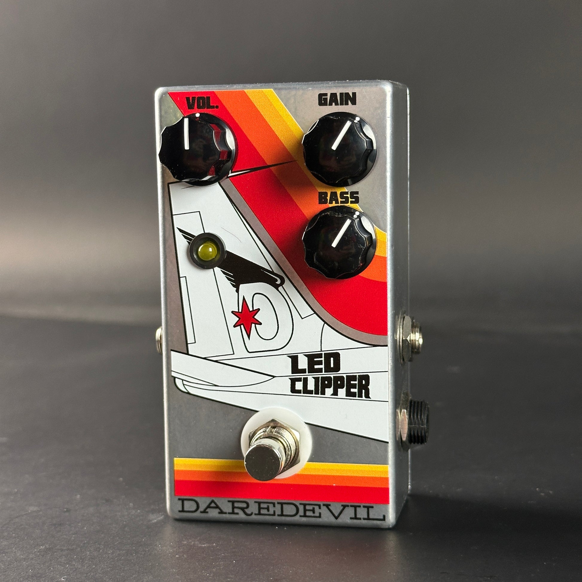 Guitar effects pedal with 'Daredevil' branding on a dark background