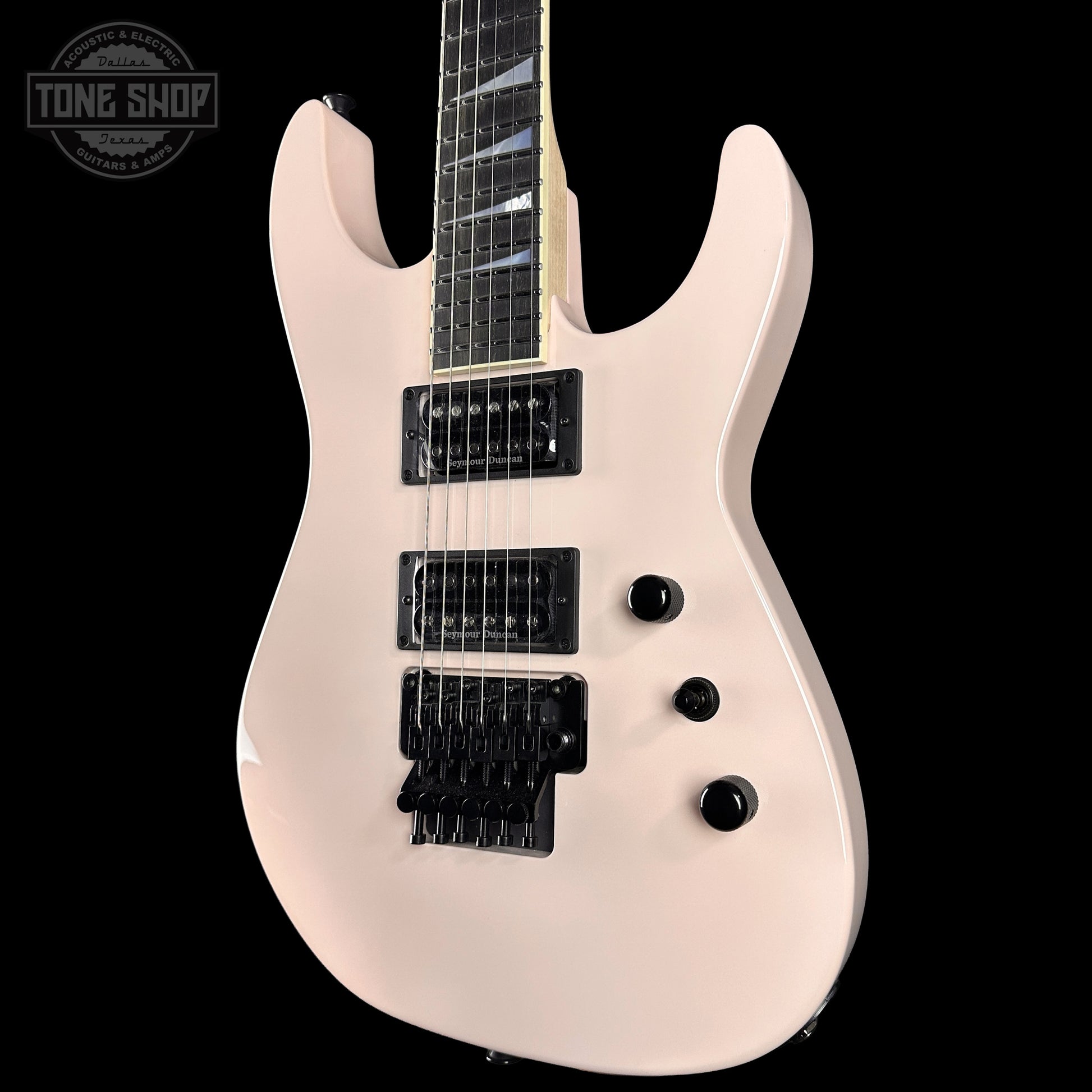 Front right angle of Jackson Custom Shop DK 2H FR Shell Pink XN010524.